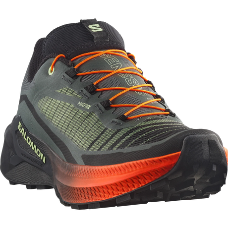 Salomon trail running shoe in dark gray and black with bright orange laces and a translucent orange midsole, shown on a white background. - Salomon Genesis 2 Shoes (Men's) - Urban Chic/Black/Lime Cream