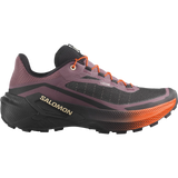 A Salomon trail running shoe in dark purple, black, and orange, shown from a lateral side profile on a solid white background. - Salomon Genesis 2 Shoes (Women's) - Huckleberry/Black/Red Orange