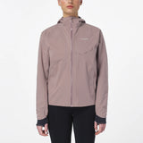 Person wearing a light brown jacket with a brand logo on a white background - Salomon Bonatti Waterproof Jacket (Women's) - Antler