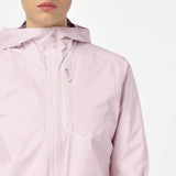 A close-up of a person wearing a light pink hooded jacket with a front zipper and a zippered chest pocket. The brand name 'balmy' is subtly printed in white on the chest pocket. - Salomon Bonatti Pro Jacket (Women's) - Icy Pink