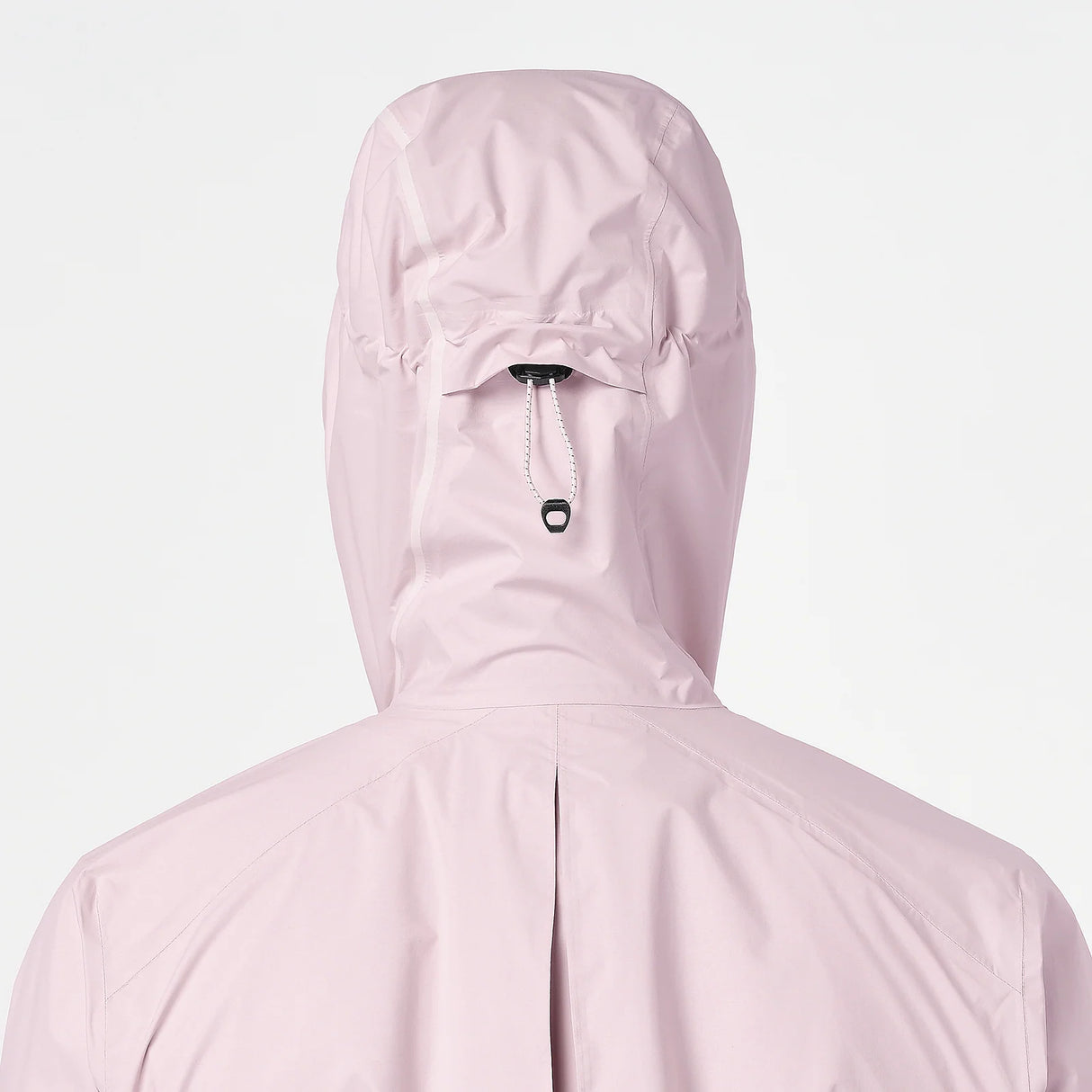 Back view of a light pink hooded jacket with a drawstring hood and a central back seam, shown against a plain light gray background. - Salomon Bonatti Pro Jacket (Women's) - Icy Pink
