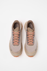Pair of beige running shoes with pink laces on a white background - NNormal Tomir 2.0 Shoes Brown (Unisex) - Brown