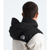 Person wearing a black The North Face jacket from behind on a white background - The North Face 1996 Retro Nuptse Jacket (Womens) - White Dune/TNF Black-Recycled Down