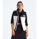 Person wearing a black and white North Face jacket on a white background - The North Face 1996 Retro Nuptse Vest (Womens) - White Dune/TNF Black-Recycled Down