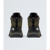 A pair of The North Face mid-height hiking boots shown from the back, featuring an olive green and black design with small yellow accents and white logo branding. - The North Face Hedgehog Mid GORE-TEX Boots (Men's) - New Taupe Green/TNF Black