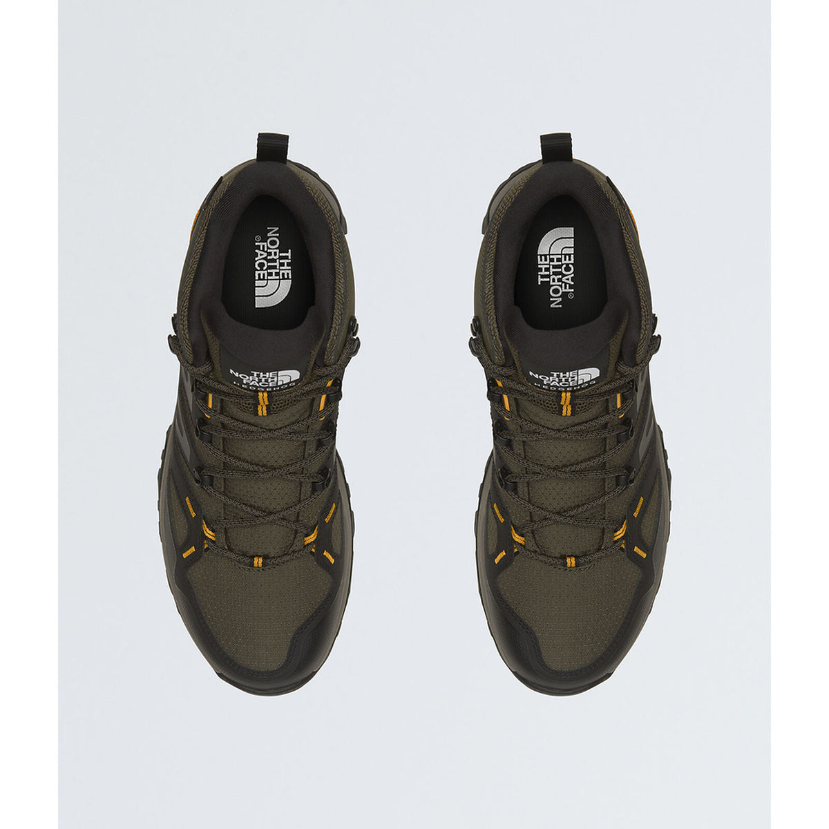 A pair of The North Face hiking shoes in olive green and black, shown from a top-down view on a light gray background. - The North Face Hedgehog Mid GORE-TEX Boots (Men's) - New Taupe Green/TNF Black