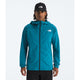 A man wearing a teal blue hooded jacket by The North Face, paired with a black beanie and black pants, standing against a light gray studio background. - The North Face Summit Series Off Width Jacket (Men's) - Dusk Blue
