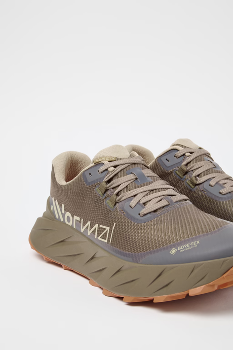 Pair of brown running shoes with visible brand logo on a white background - NNormal Cadí GORE-TEX Shoes (Men's) - Brown