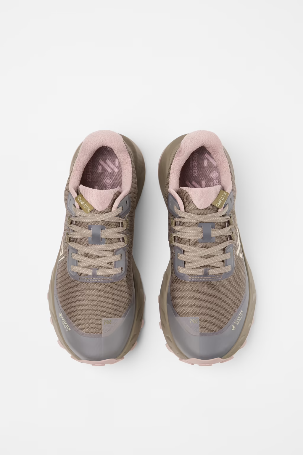 A pair of trail running shoes in a muted taupe and dusty pink colorway, shown from a top-down view on a clean white background. - NNormal Cadí GORE-TEX Shoes (Women's) - Brown