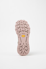 Close-up of a pink shoe sole with tread pattern on a white background - NNormal Cadí GORE-TEX Shoes (Women's) - Brown