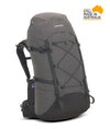 A gray and black technical hiking backpack with compression straps and a grid pattern, shown on a white background with a 'Still Made in Australia' badge in the top right corner. - One Planet Extrovert 55 Pack - Black