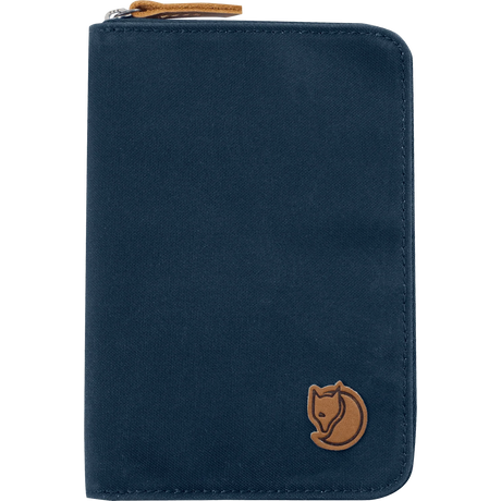 A dark navy blue zippered document pouch with a brown leather fox logo patch on the bottom right and a matching brown leather zipper pull, shown on a plain white background. - Fjällräven Passport Wallet - Navy