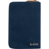 A navy blue canvas zippered document pouch with a tan zipper pull and 'G-1000' printed in tan near the bottom right, shown on a plain white background. - Fjällräven Passport Wallet - Navy