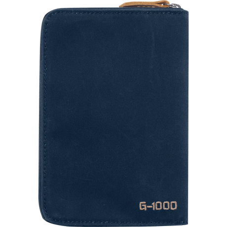 A navy blue canvas zippered document pouch with a tan zipper pull and 'G-1000' printed in tan near the bottom right, shown on a plain white background. - Fjällräven Passport Wallet - Navy