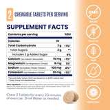 Supplement facts label for chewable tablets, showing a nutrition table with calories, carbohydrates, sugars, calcium, magnesium, sodium, and potassium. The label includes icons for Non-GMO, Gluten Free, Vegan, No Artificial Colors of Sweeteners, and Natural Flavor, plus text stating 2 chewable tablets per serving and a small photo of round beige tablets. - SaltStick FastChews - Peach 