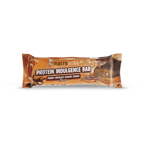 A packaged protein indulgence bar in a brown wrapper labeled 'macromike PROTEIN INDULGENCE BAR' with 'PEANUT CHOCOLATE CARAMEL CRUNCH' and 'Flavor: Peanut' visible on a white background. - Macro Mike Protein Indulgence Bar (50g) - Peanut Chocolate Caramel Crunch