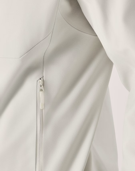 Close-up of a light gray zippered jacket or outerwear garment, showing the fabric texture and zipper detail. - Arc'teryx Gamma MX Hoody (Men's) - Sea Salt