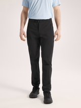 Person wearing black pants and a light blue shirt on a beige background - Arc'teryx Gamma SL Pants (Men's) - Black