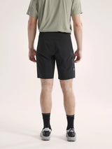 Person wearing black shorts on a light pink background - Arc'teryx Gamma SL Shorts 9" (Men's) - Black