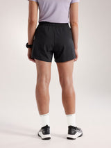 Person wearing black athletic shorts on a plain background - Arc'teryx Norvan Shorts 5" 2-in-1 (Women's) - Black