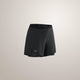 Black athletic shorts with a drawstring waist and a small Arc'teryx logo near the hem, shown against a light beige studio background. - Arc'teryx Norvan Shorts 5" 2-in-1 (Women's) - Black