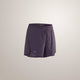 A pair of Arc'teryx running shorts in a muted purple shade, shown against a plain light beige studio background. - Arc'teryx Norvan Shorts 5" 2-in-1 (Women's) - Moondrop