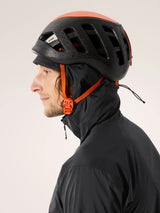 Person wearing a black helmet with orange accents and a black jacket on a light gray background - Arc'teryx Squamish Hoody (Men's) - Black