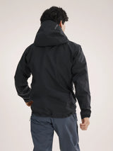 Person wearing a black jacket on a light gray background - Arc'teryx Beta SV Jacket (Men's) - Black