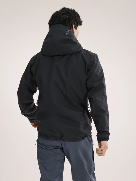 Person wearing a black jacket on a light gray background - Arc'teryx Beta SV Jacket (Men's) - Black
