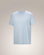 A light blue short-sleeve crewneck t-shirt with a small tonal logo on the left chest, displayed against a neutral beige gradient background. - Arc'teryx Cormac Crew Neck Shirt Short Sleeve (Men's) - Alpine Blue