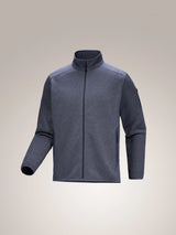 Gray fleece jacket on a beige background - Arc'teryx Covert Cardigan (Men's) - Dark Stratus Healther/Black Sapphire