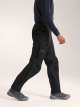 Person wearing black pants and gray shoes on a white background - Arc'teryx Beta Pants (Men's) - Black