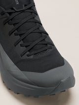 Black and gray sneaker on a light beige background - Arc'teryx Norvan LD 4 Shoes (Men's) - Black/Graphite