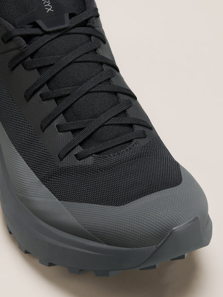 Black and gray sneaker on a light beige background - Arc'teryx Norvan LD 4 Shoes (Men's) - Black/Graphite