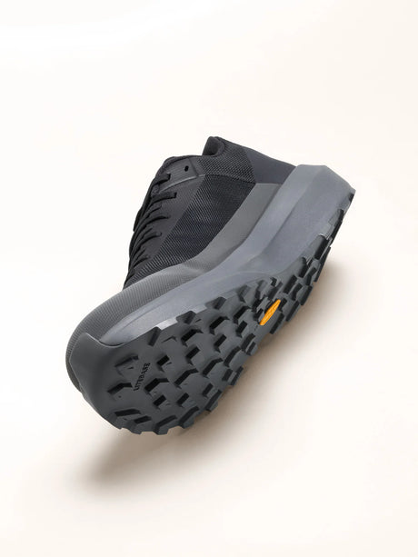 Black boot with a textured sole on a white background - Arc'teryx Norvan LD 4 Shoes (Men's) - Black/Graphite