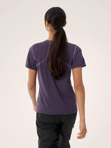 Person wearing a purple athletic shirt with white accents on a plain background - Arc'teryx Sunna Crew Shirt Short Sleeve (Women's) - Moondrop