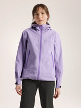 Woman wearing a light purple jacket with a hood on a plain background - Arc'teryx Beta Jacket (Women's) - Mallow