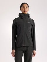 Person wearing a black jacket with a brand logo on a white background - Arc'teryx Gamma Lightweight Hoody (Women's) - Black