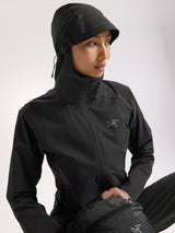 Person wearing a black jacket with a hood on a white background - Arc'teryx Gamma Lightweight Hoody (Women's) - Black