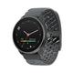 A dark gray smartwatch with a round black face and a perforated dark gray silicone strap, shown at an angle on a plain white background. - Suunto Race S Titanium GPS Sports Watch - Graphite