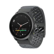 A dark gray smartwatch with a round black face and a perforated dark gray silicone strap, shown at an angle on a plain white background. - Suunto Race S Titanium GPS Sports Watch - Graphite