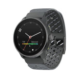 A dark gray smartwatch with a round black face and a perforated dark gray silicone strap, shown at an angle on a plain white background. - Suunto Race S Titanium GPS Sports Watch - Graphite