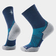 Pair of blue and gray socks on a light gray background - Smartwool Run Targeted Cushion Mid Crew Socks (Unisex) - Deep Navy
