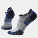 Pair of gray and blue socks on a light gray background - Smartwool Hike Targeted Cushion Low Ankle Socks (Unisex) - Light Grey