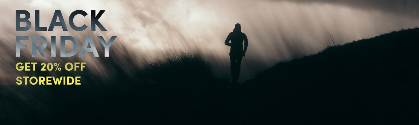 Black Friday promotional poster from find your feet australia and outdoor and trail running store. black friday displayed transparent and get 20% off storewide displayed in yellow over a picture of a man trail running on a mountain on a cloudy misty and dark day.