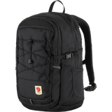 A black Fjälör backpack with multiple zippered compartments, a front lace-up strap detail, and a small red logo patch on a white background. - Fjällräven Skule 20 Backpack - Black
