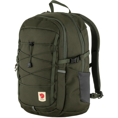 Fjälleväl outdoor backpack in olive green with a dark gray side pocket, front compression straps, and a Fjälleväl logo patch on the lower front, shown on a plain white background. - Fjällräven Skule 20 Backpack - Deep Forest