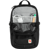 Black backpack with compartments and visible brand logo on a white background - Fjällräven Skule 28 Backpack - Black