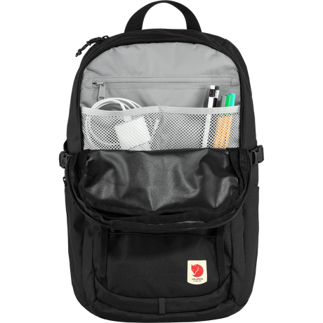 Black backpack with compartments and visible brand logo on a white background - Fjällräven Skule 28 Backpack - Black