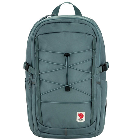 Teal backpack with a brand logo on a white background - Fjällräven Skule 28 Backpack - Nimbus Blue